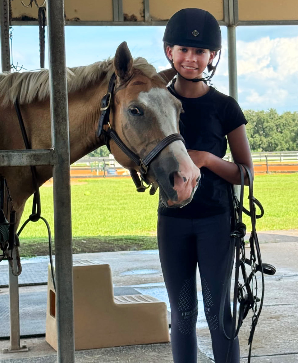 Galaxy Farms Boarding - Girl with her horse